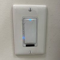 Light Switch with large up / down rocker button and blue LEDs on left side